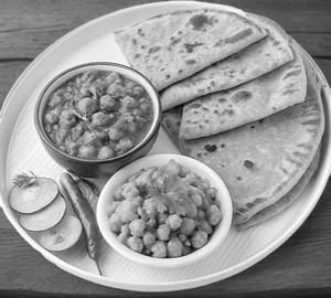 Chole And 2 Aloo Paratha With Achar