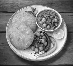 Chole And 2 Aloo Kachori With Achar 