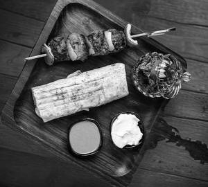 Charcoal achari kebab wrap