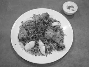 Lucknowi Chicken Dum Biryani