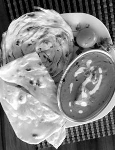 Butter Chicken + 1 Butter Naan + 1 Laccha Parantha