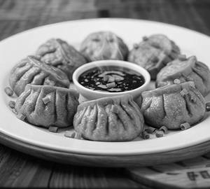 Manchurian momos [veg] [7 pieces]