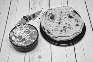 2 Lacha Paratha, Chicken Butter Masala Half