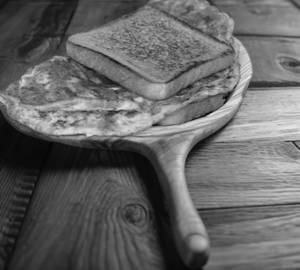 Two egg omlette with two slice of bread (street style)