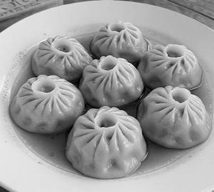 Soupy momos [non veg] [7 pieces]