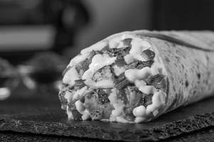 Baked Paneer Tikka Pizza Wrap.