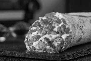Baked Chicken Tikka Pizza Wrap.
