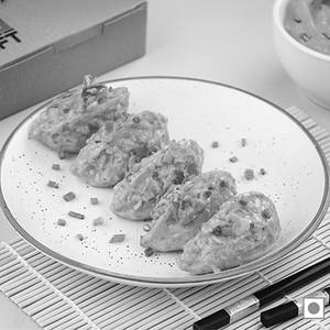 Veg Afghani Creamy Momos