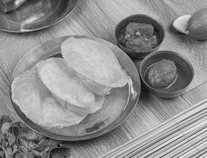 Luchi (3pcs) With Alu Dum(2pcs) And Egg Kosha (1pc)