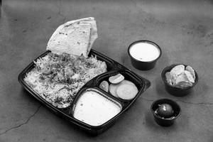 Veg Biryani+papad + Raita