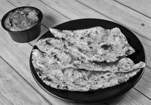 Garlic Naan 1pcs + Aloo Do Pyaja + Pickles + Onions (serves 1)