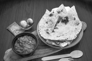 Butter Naan (1 Pc) + Dum Aloo + Pickles + Onions (serves 1)