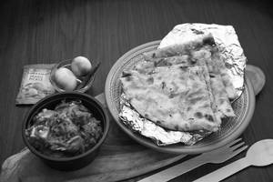 Masala Kulcha (1 Pc) + Kadai Paneer + Pickles + Onions (serves 1)