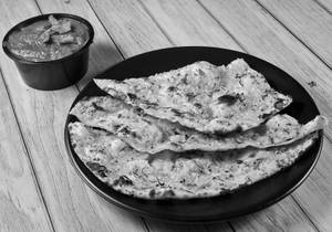 Garlic Naan 1pcs + Dum Aloo + Pickles + Onions (serves 1)