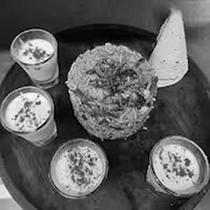 Veg Biryani With Veg Raita & Papad
