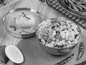 Dhakai Mutton Pulao (with 1pc Egg Rezala 2 Pcs Mutton)