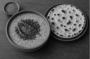 Dal-tadka With Tandoori Roti(02 Nos.)+onion Slice