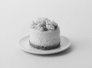 WHITE CHOC MACADAMIA CHEESECAKE
