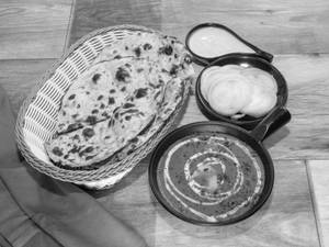 Dal Makhani With 2 Butter Roti