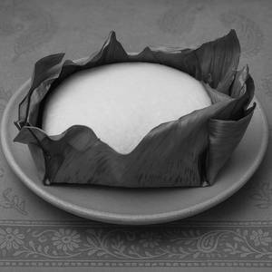 Traditional Banana Leaf Steamed Idli (1 Pcs)
