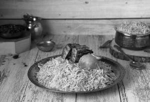 Paneer Dum Hydrabadi Biryani With Raita