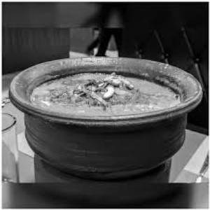 Manpaanai dum parotta chicken