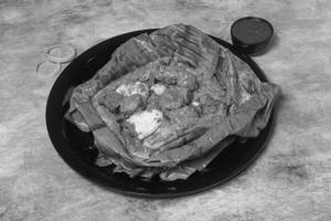 Mutton Kizhi Parotta