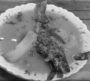 Tengra fish with outenga (curry)