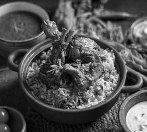 Mutton Dum Biryani With Raita And Salad