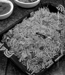 Veg. Triple Schezwan Rice (Greavy).