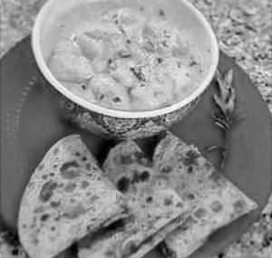 Lachha Parantha With Kadhi Pakoda