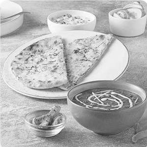 Onion Kulcha With Dal & Raita