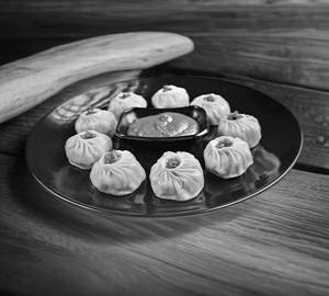 Veg Steamed Momos [12 Piece ]
