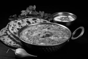 Dal fry combo(half dal fry+ 4 butter tawa roti )