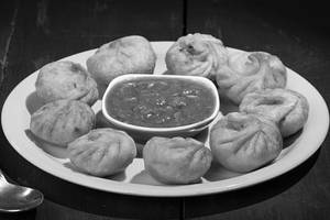 Chicken Cheese Momos (free 2 Dips))