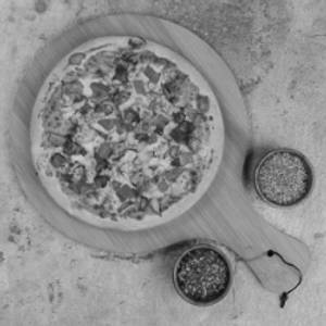 Schezwan Cheesy Non Veg Pizza