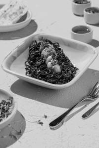 Charcoal spaghetti with garlic butter lobster