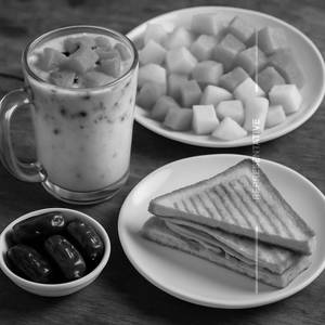 Mohabath sarbath + cut fruit +dates + sandwich