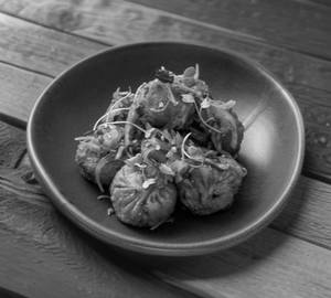 Veg Pan Fried Momos [7 Pieces]