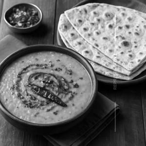 Dal Tadka and Rumali Roti (3 Pcs)