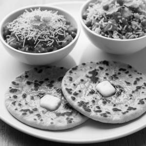 Sev Tamatar + Tawa Butter Roti ( 2 Pcs) + Veg Pulao