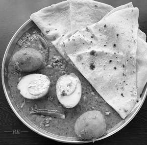 Egg Masala + 2 Butter Roti + Jeera Rice