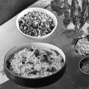 Moong Dal Rice 450 Ml + Veg 250 Ml + Fryums + Pickle