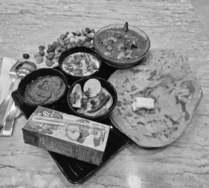 Paneer masala with two butter paratha's and buttermilk