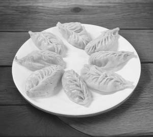 Pork Momos Steamed [8 pieces]