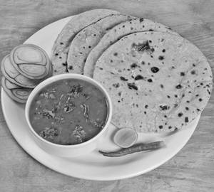 Dal Fry With 4 Tawa Roti 