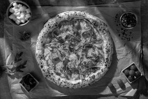 Naples Woodfired Sundried Tomato & Rocket Pizza