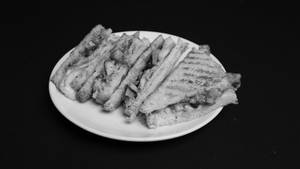 Schezwan Chicken And Cheese Sandwich