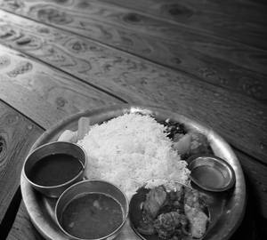 Veg Thali + Chicken Curry (8 Items)