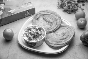 Aloo Dum with lachha Paratha [2pc]